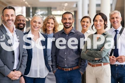 Portrait Of Successful Group Of Business People At Modern Office Looking At Camera Portrait Of Happy Businessmen And Satisfied Businesswomen Standing As A Team Multiethnic Group Of People Smiling