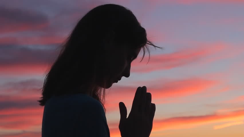 Woman Praying Looking Up With Hands Open To Sky Silhouette Beautiful Sunset