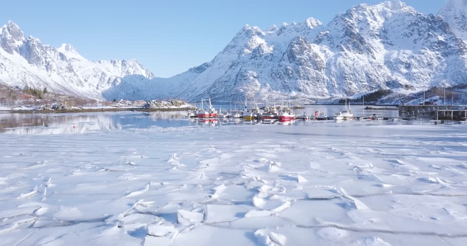 Aerial Panorama Drone View Of Beautiful Lofoten Islands Winter Scenery With Traditional Fishing Boats Lying In Harbor On A Cold Sunny Day With Scenic Blue Sky Norway Scandinavia Northern Europe