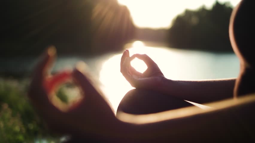 Young Healthy Girl Practicing Yoga By The Lake At Summer Evening Shallow Dof Close Up On Girls Hand Fitness Health Nature Energy Concept Shot In 4K UHD