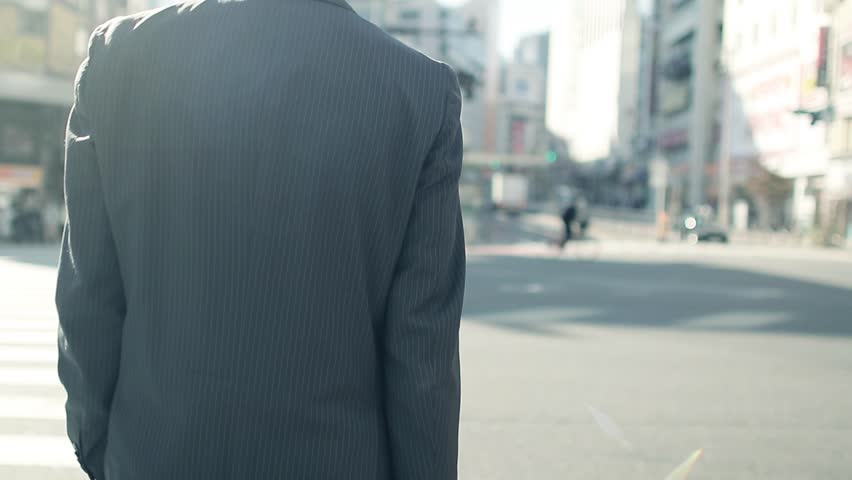 Walking Businessman In Tokyo