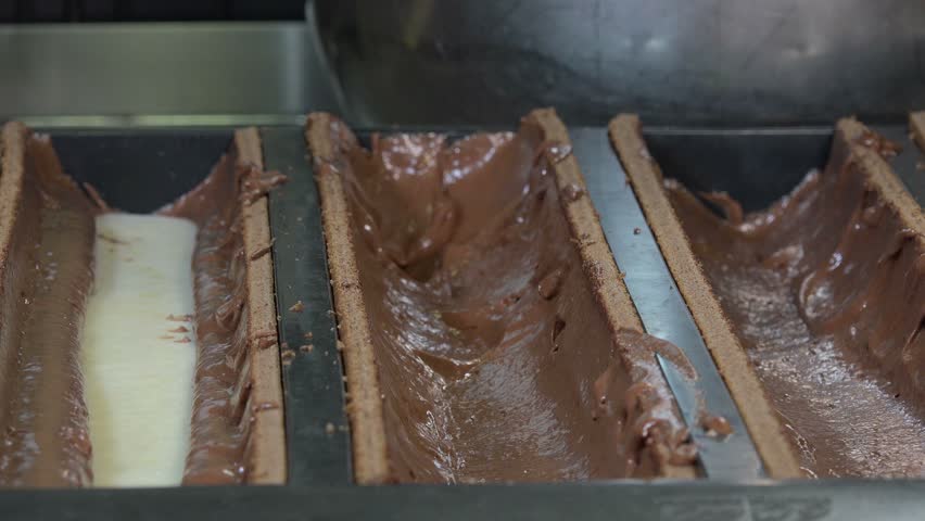 Preparation Of A Yule Log Pear And Pralineprojection Of The Topcoat Of The Yule Log