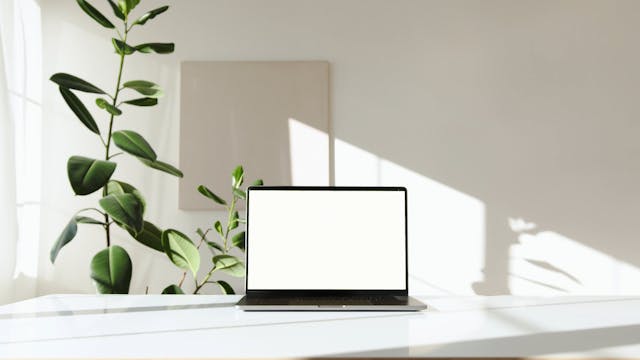 Laptop Computer On White Table