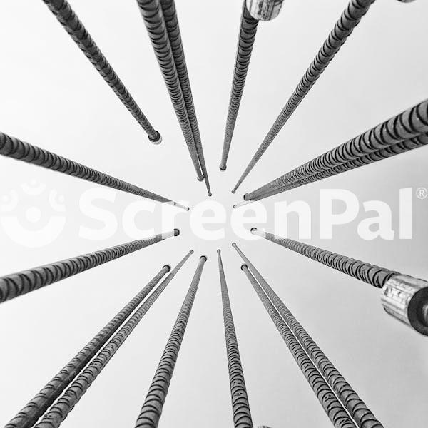 A Black And White Photo Of A Bunch Of Metal Poles