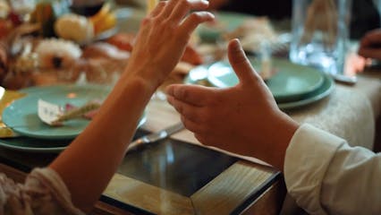 Holding Hands In The Thanksgiving Dinner