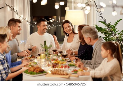 Celebration Holidays And People Concept   Happy Family Having Dinner Party At Home