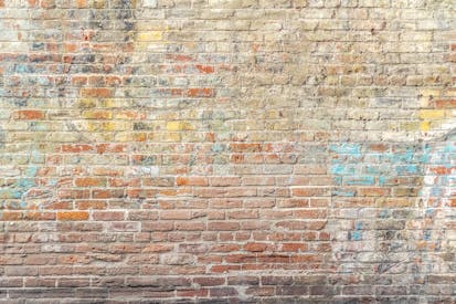 Closeup Photo Of Brown Brick Wall