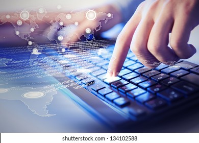 Hands Of A Young Man On The Keyboard With The Elements Collage