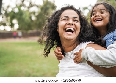 Happy Indian Mother Having Fun With Her Daughter Outdoor   Family And Love Concept   Focus On Mum Face